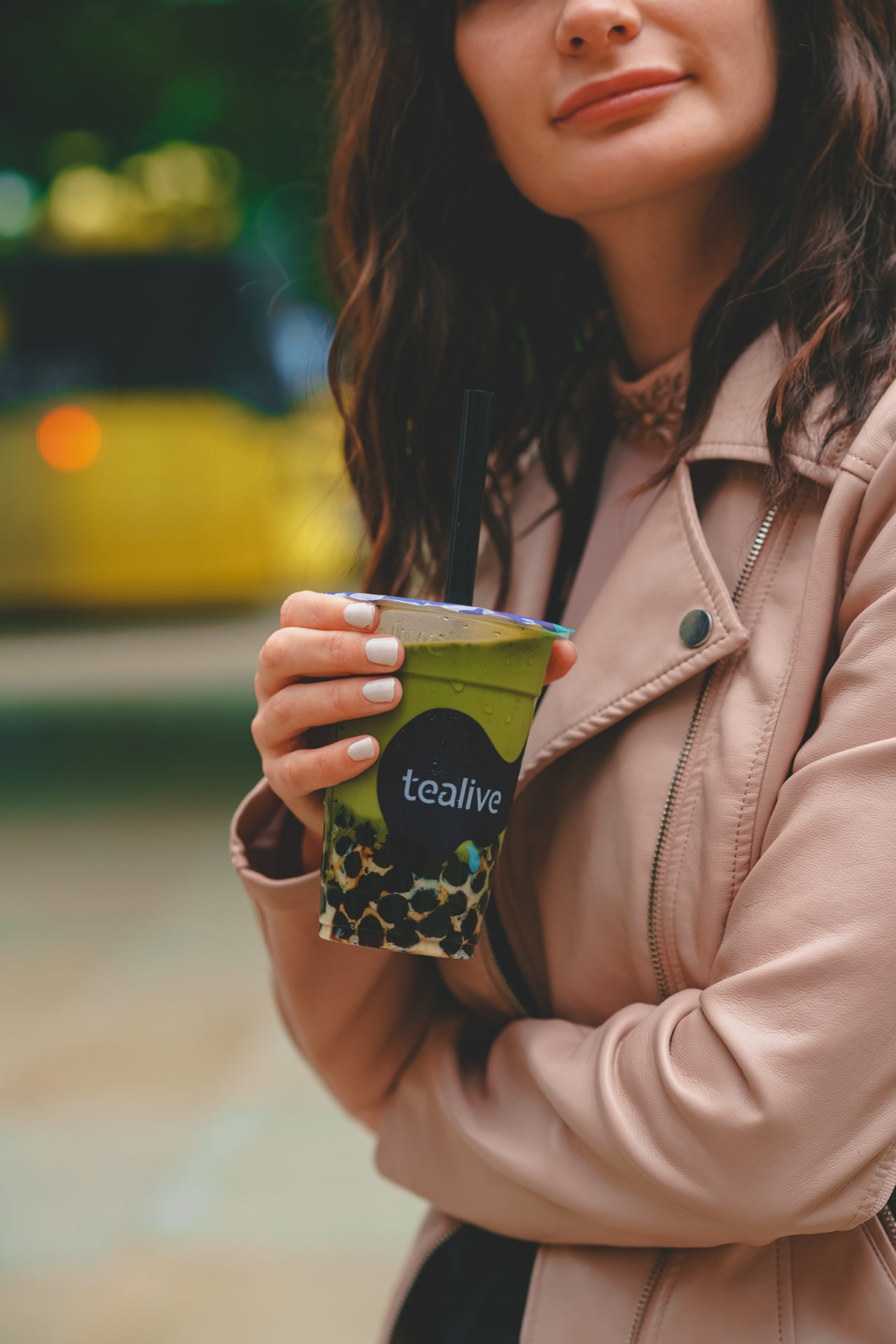 Woman holds Tealive bubble tea